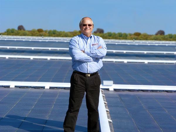 Pete Wenzel, President and CEO of General Data, with the solar panels on the rooftop of the Ferguson manufacturing facility